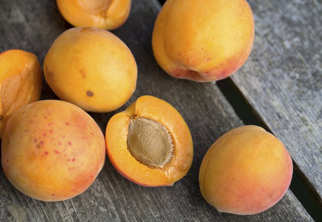 apricots on wooden background