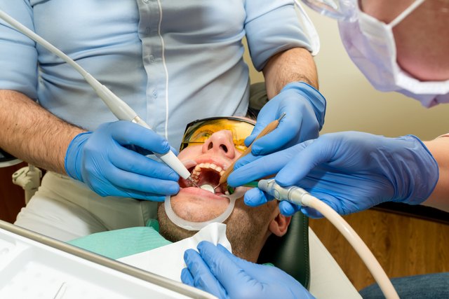Dentist doing a dental treatment on a patient