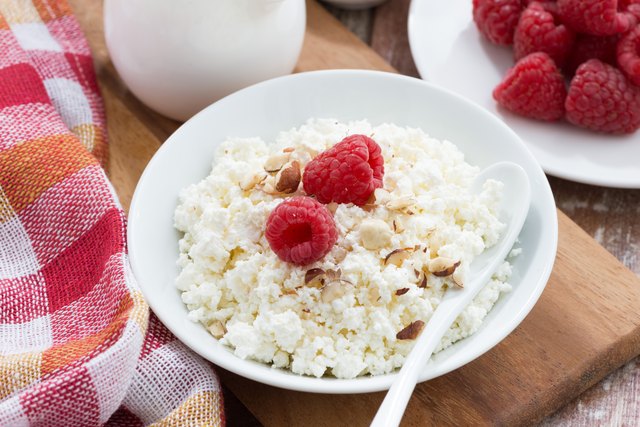 cottage cheese with fresh raspberry, top view