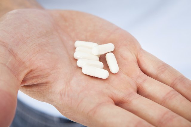 Hand Holding Medicines