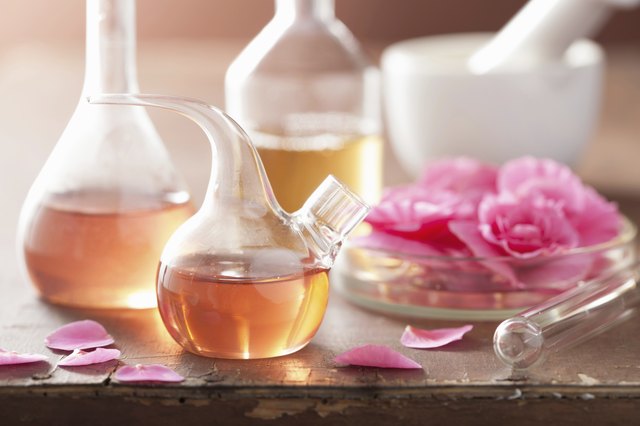 aromatherapy and alchemy with pink flowers