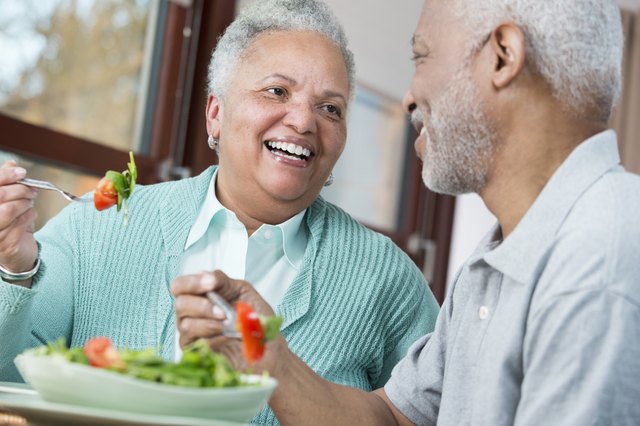 Black couple eating salad
