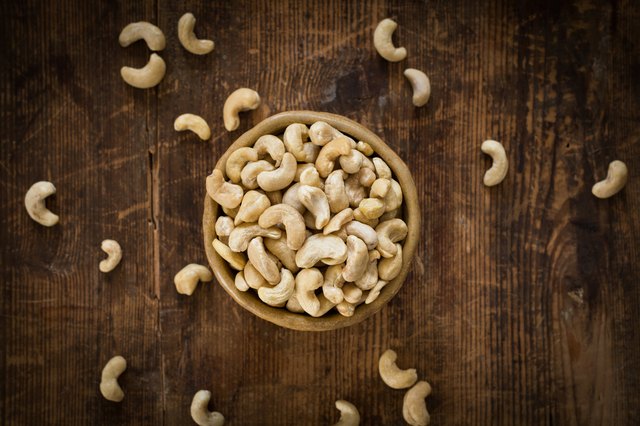 Cashew nuts in bowl, top view