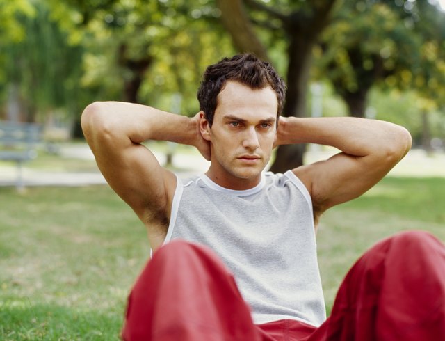 young man exercising in a park