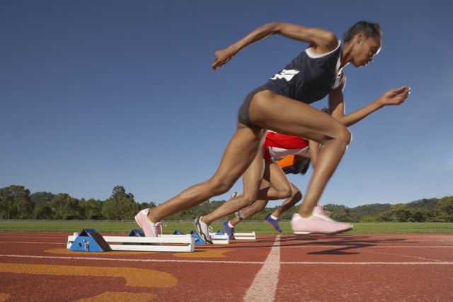 Female runners breaking from start line
