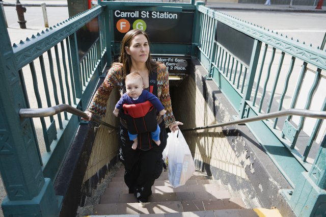 Mother and baby on subway steps