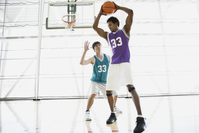 Basketball player blocking shot