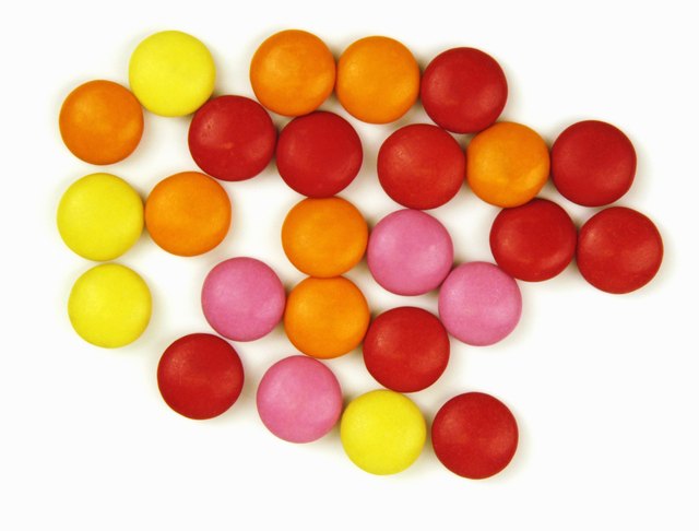 Colorful red, orange, yellow and pink sugarcoated sweets