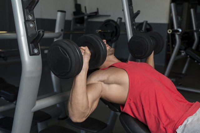 Man Pressing Dumbbells