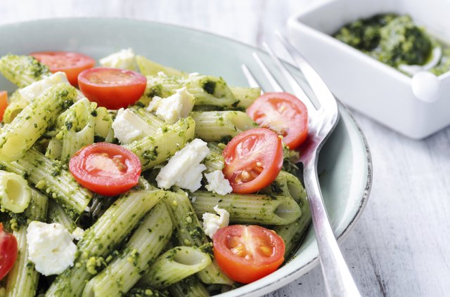 Pasta with pesto and fresh ingredients