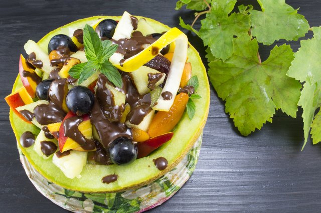 Healthy unique fruit salad served with chocolate