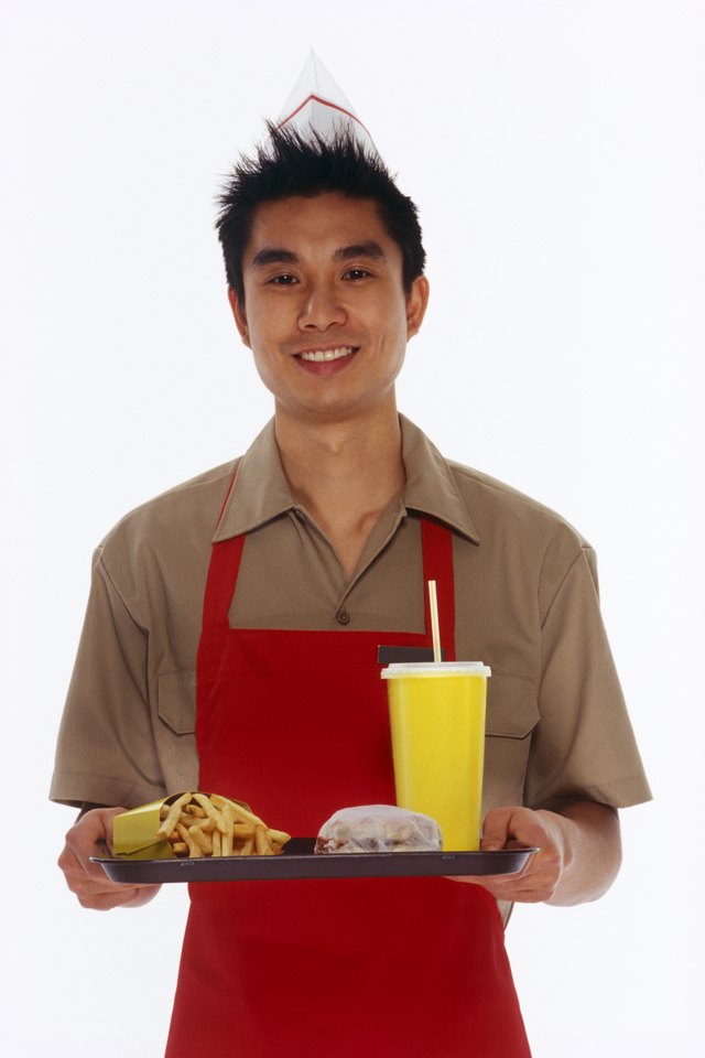 Fast food employee with tray