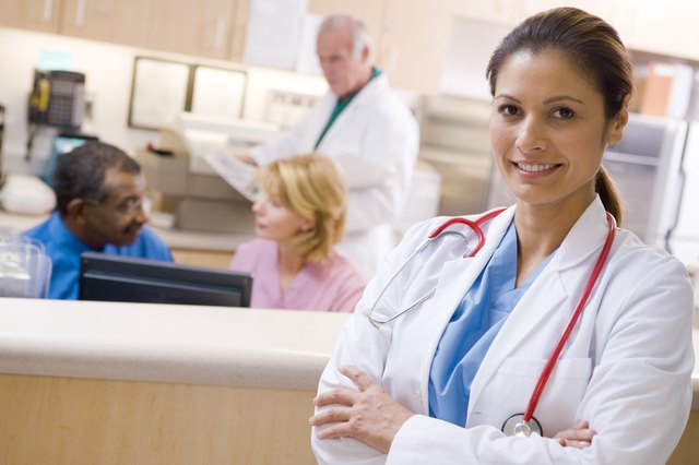 Doctors And Nurses At The Reception Area Of A Hospital