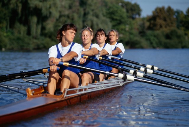 Crew team rowing