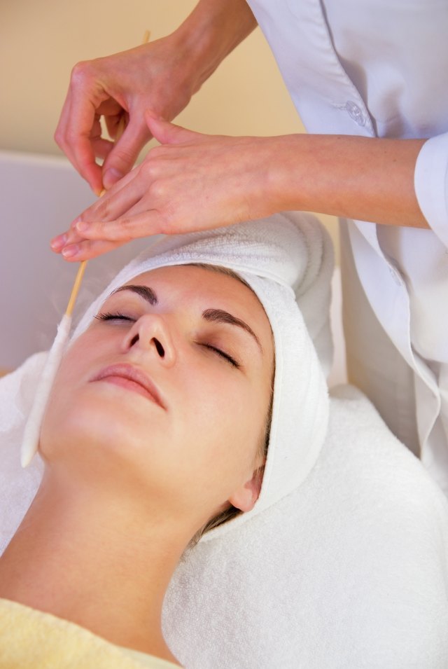 Facial cryogenic massage in spa salon