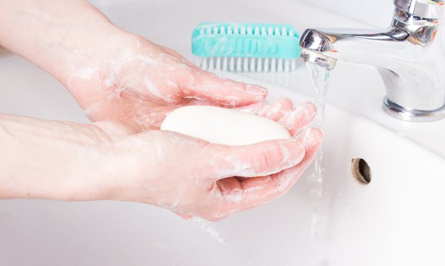 woman washing her hands