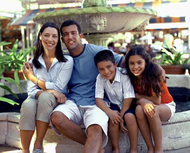 Family by a fountain