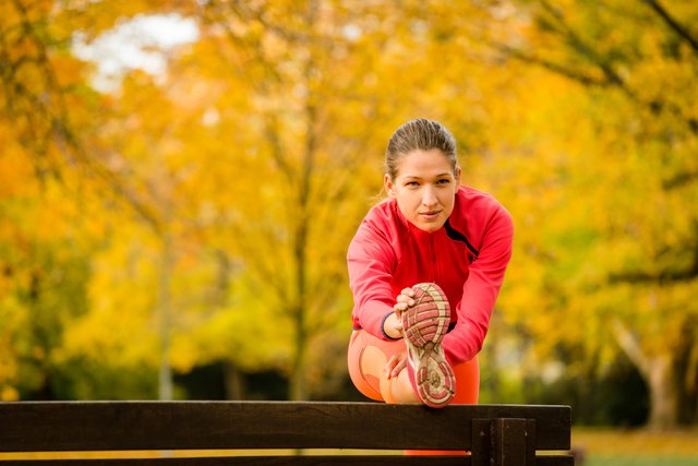 Woman stretching before jogging