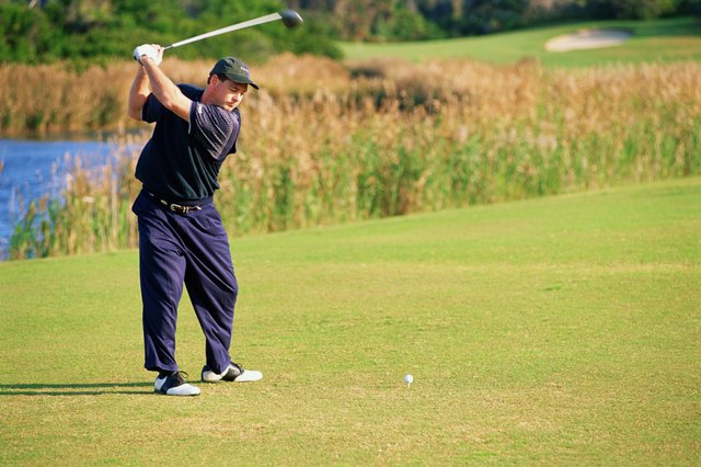 Man playing golf