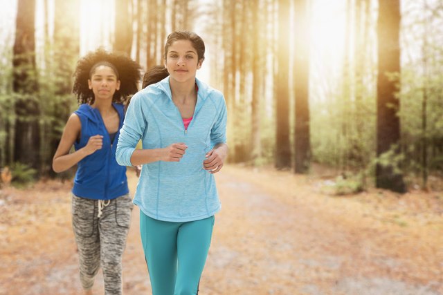 USA, New Jersey, Portrait of teenage girls (14-15, 16-17) running