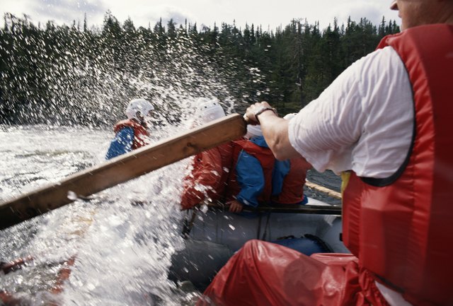 Group of people in canoe, close-up