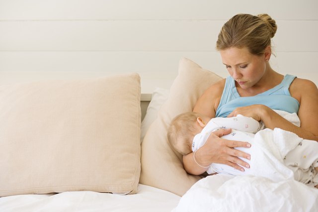 Woman breastfeeding baby