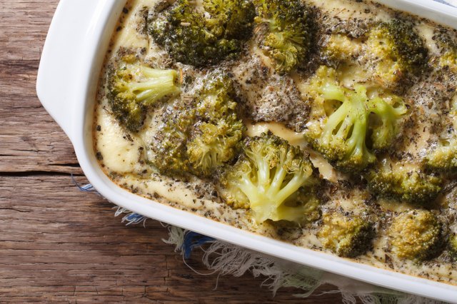 Broccoli casserole close-up on the table. horizontal top view