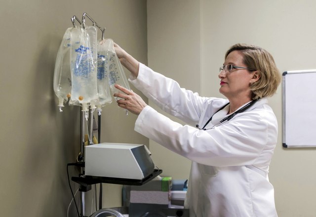 Doctor Checking IV Bag