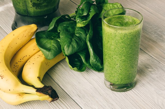 Smoothie in a glass on a wooden table