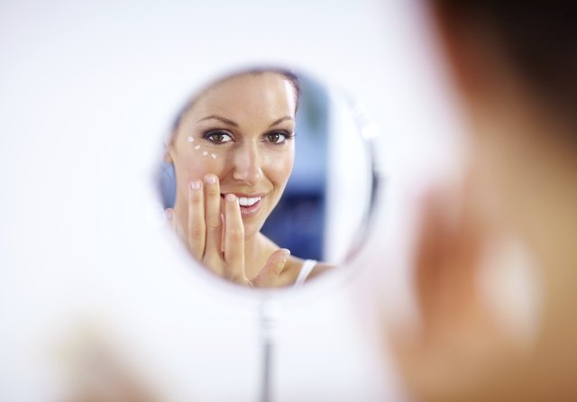 Giving thought to the health of her skin