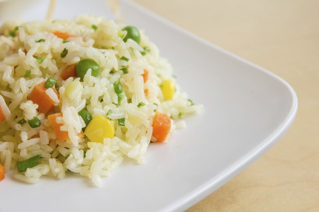 fried rice with butter on white dish
