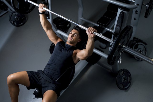Young Man Working Out in the Gym
