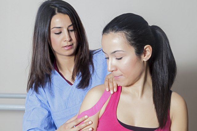 Patient at physiotherapy with tapes