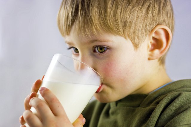 child drinking milk