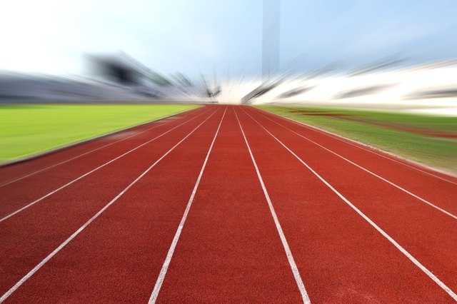 Running Track At A Sport Stadium (radial blur up image)