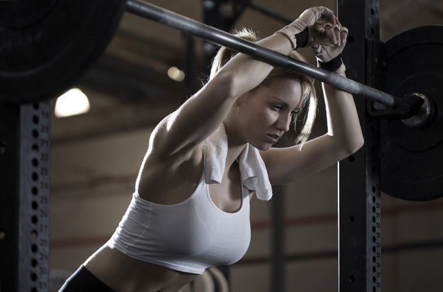Woman training at crossfit center