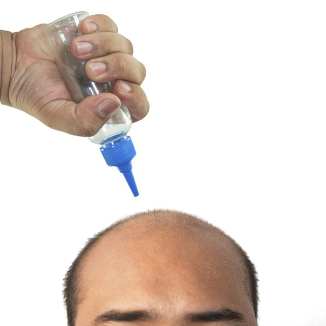 man bald head on white and hand hold clear bottle