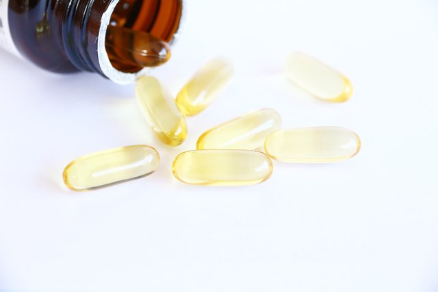 gel vitamin supplements on white