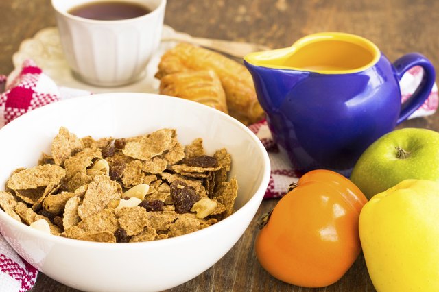 delicious healthy granola with dry fruits, nuts and milk.