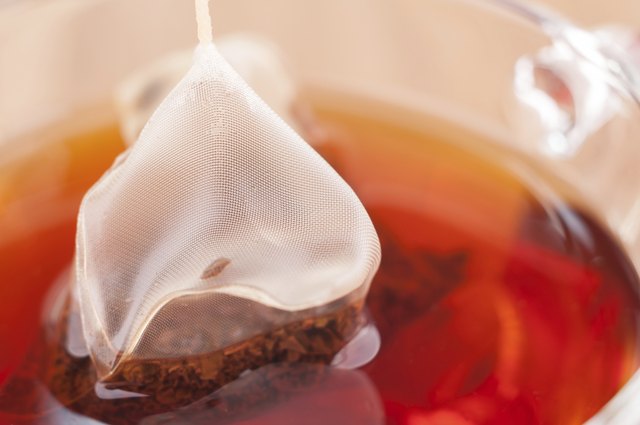Pyramid mesh tea bag in a cup extreme close-up