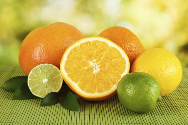 Fruits with leafs on bright background