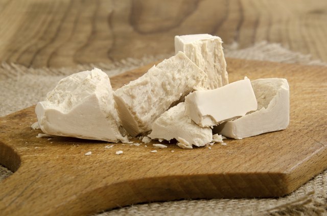 yeast cube on a wooden board