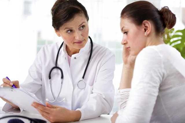 doctor with female patient