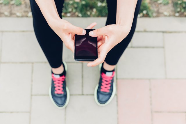 Closeup of woman using mobile phone