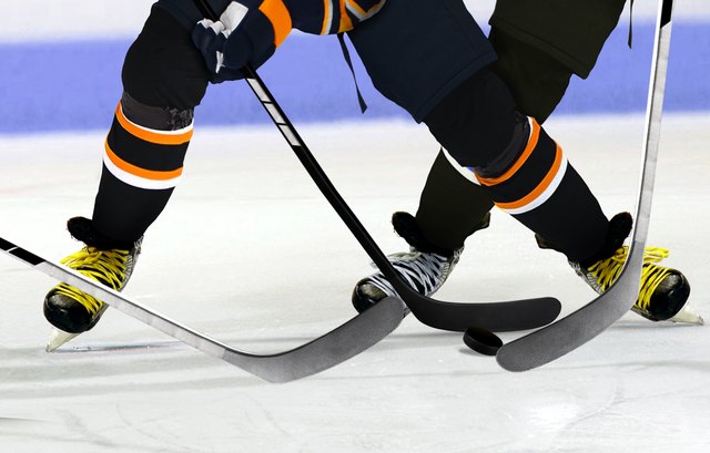 Ice Hockey players on rink