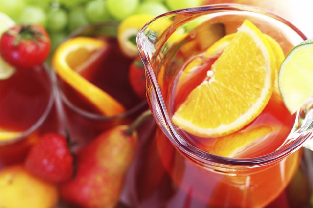 Refreshment beverage in pitcher with fruits