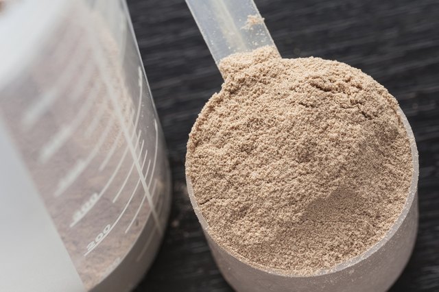 Scoop of chocolate whey isolate protein