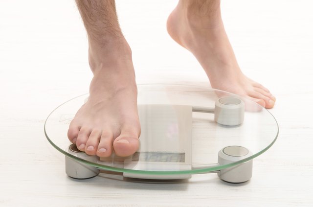 standing on scales