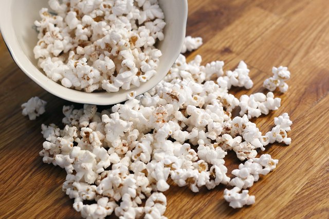 how to make seasoning stick to air popped popcorn
