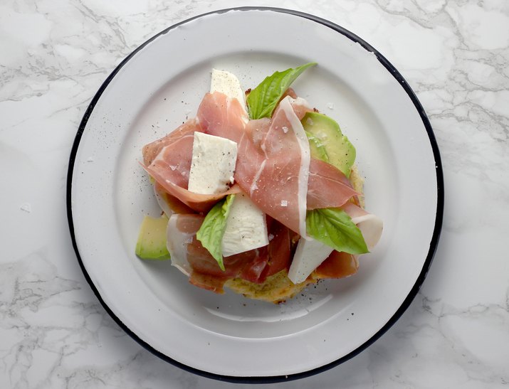 Prosciutto mozzarella avocado toast on cauliflower bread